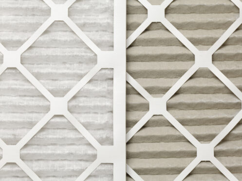 Clean and dirty air filters, side by side.