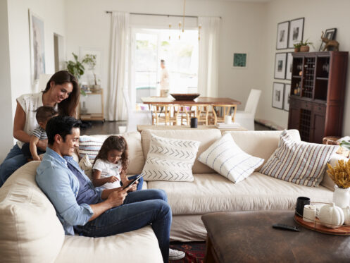 A young family reading together in their Grand Junction home.